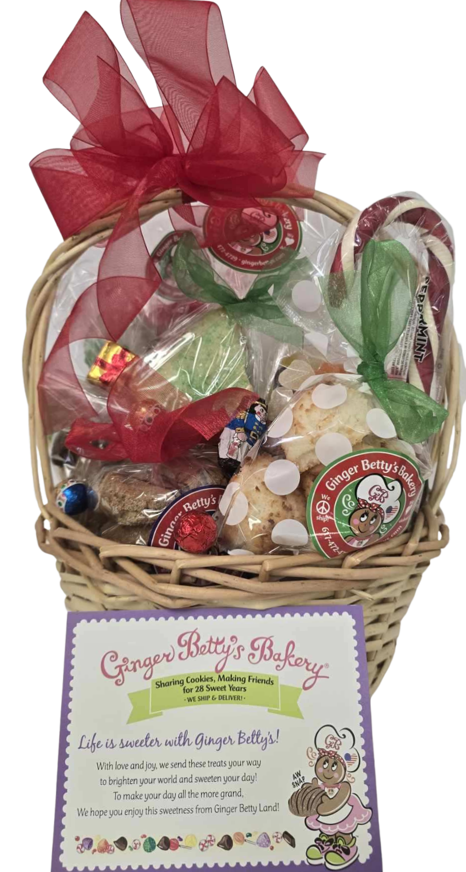 Gift basket with gingerbread-themed items and a label from Ginger Betty's Bakery on a white background.